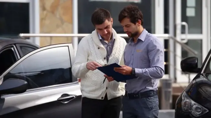 Completing a car rental agreement